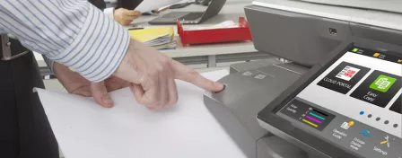 A person using an MFP